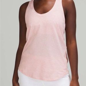 Lululemon love tank- Heathered pink, size 2.  Excellent condition, like new.